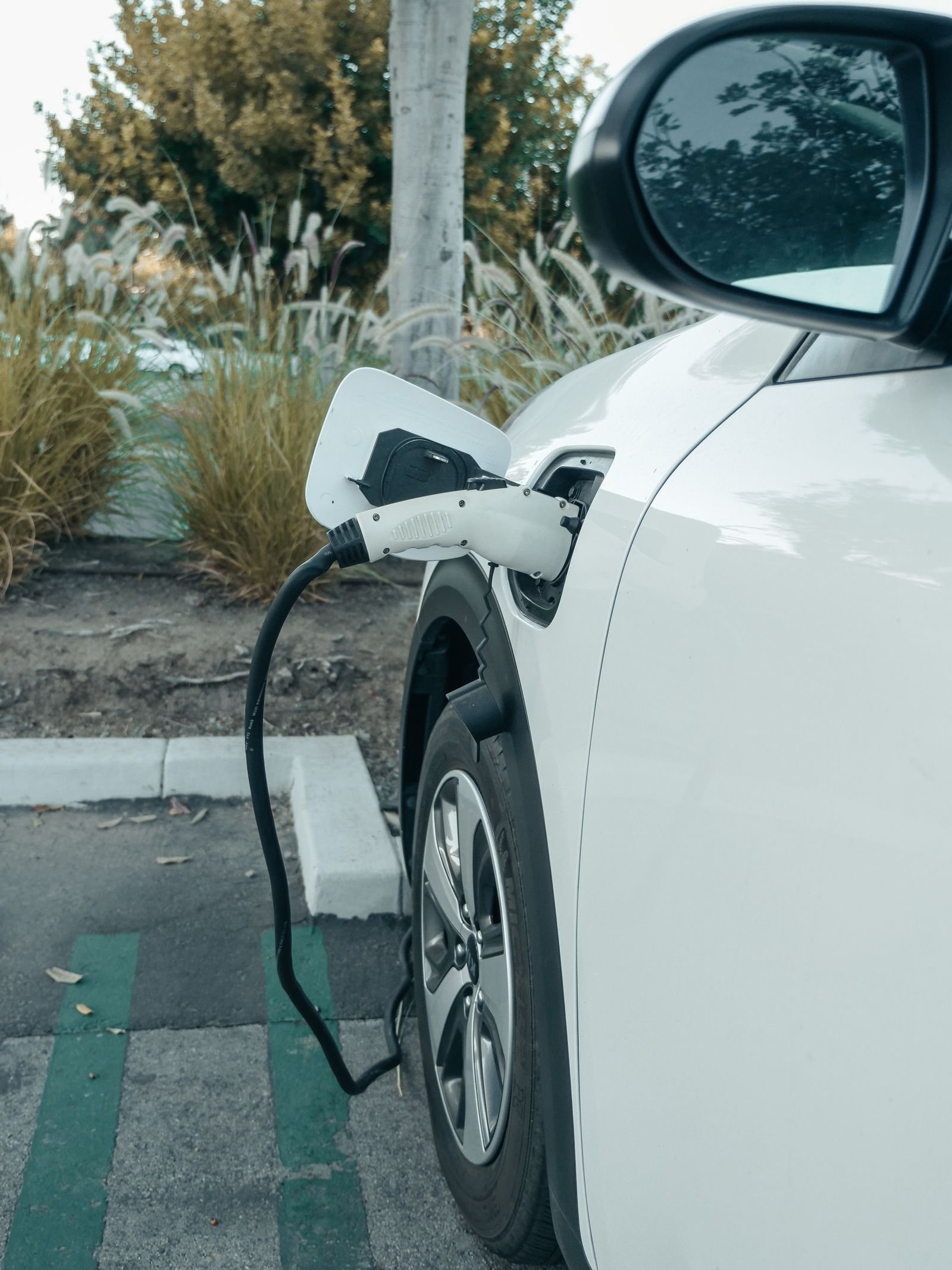 An electric vehicle plugged into a Level 2 home charger